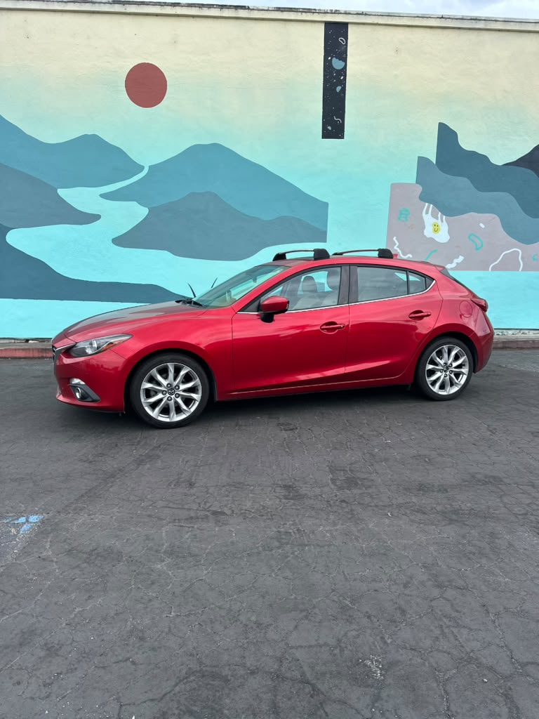 Mazda 3 side view sleek hatchback Santa Cruz Capitola car rental