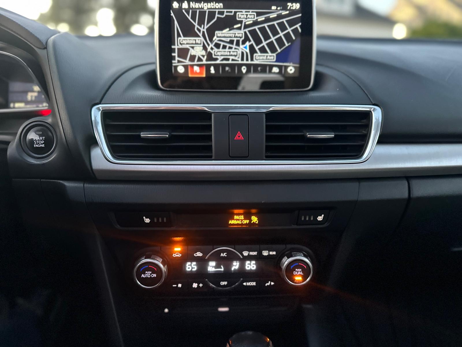 Mazda 3 front view sporty hatchback Santa Cruz California car rental