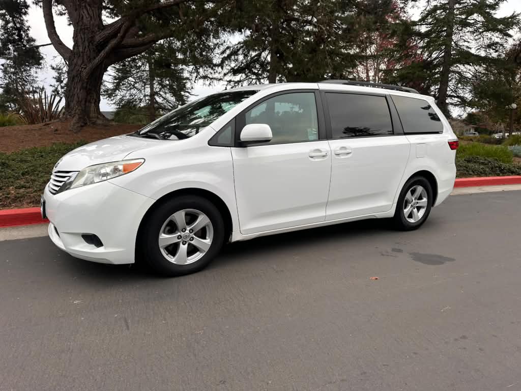Toyota Sienna LE 2017 side view minivan rental Santa Cruz California